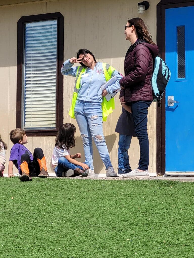 A GOAL high school student volunteering at safety town