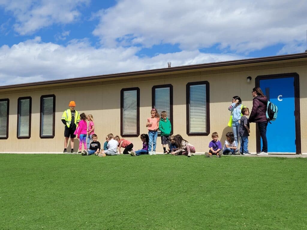 GOAL students volunteering at safety town.